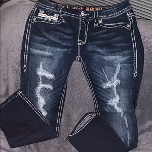 Dark distressed rock revival Capri